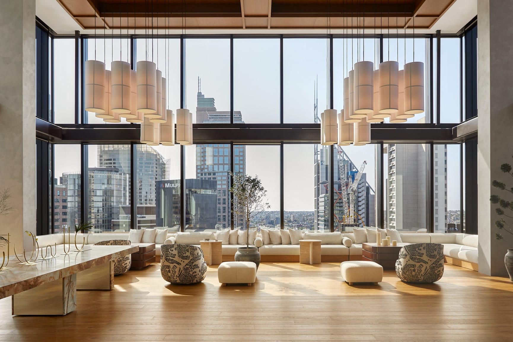 MA Financial Group's level 27 boardroom, floor to ceiling windows looking out over Sydney skyline