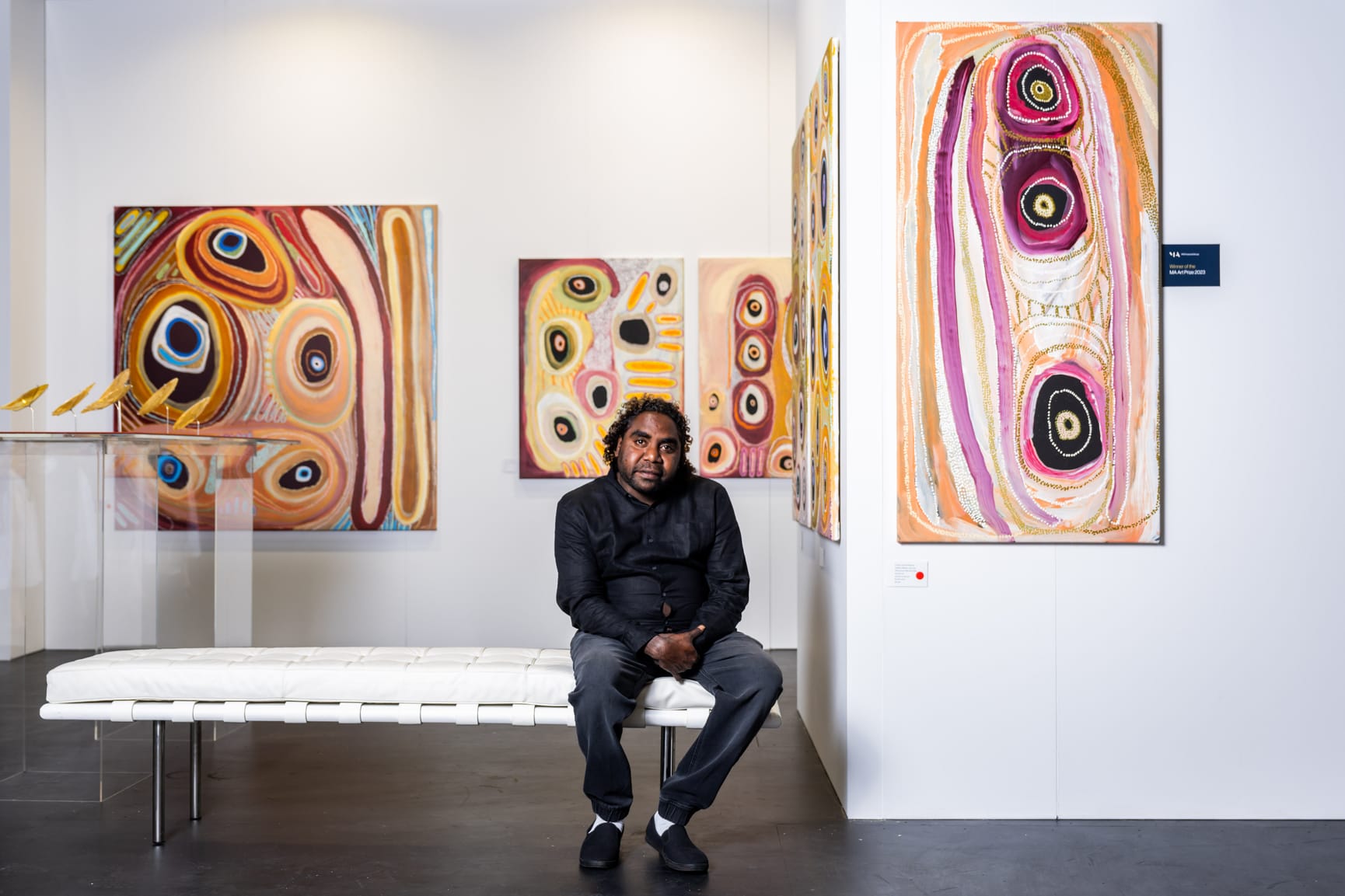 MA Art Prize winner 2023 in front of his artworks